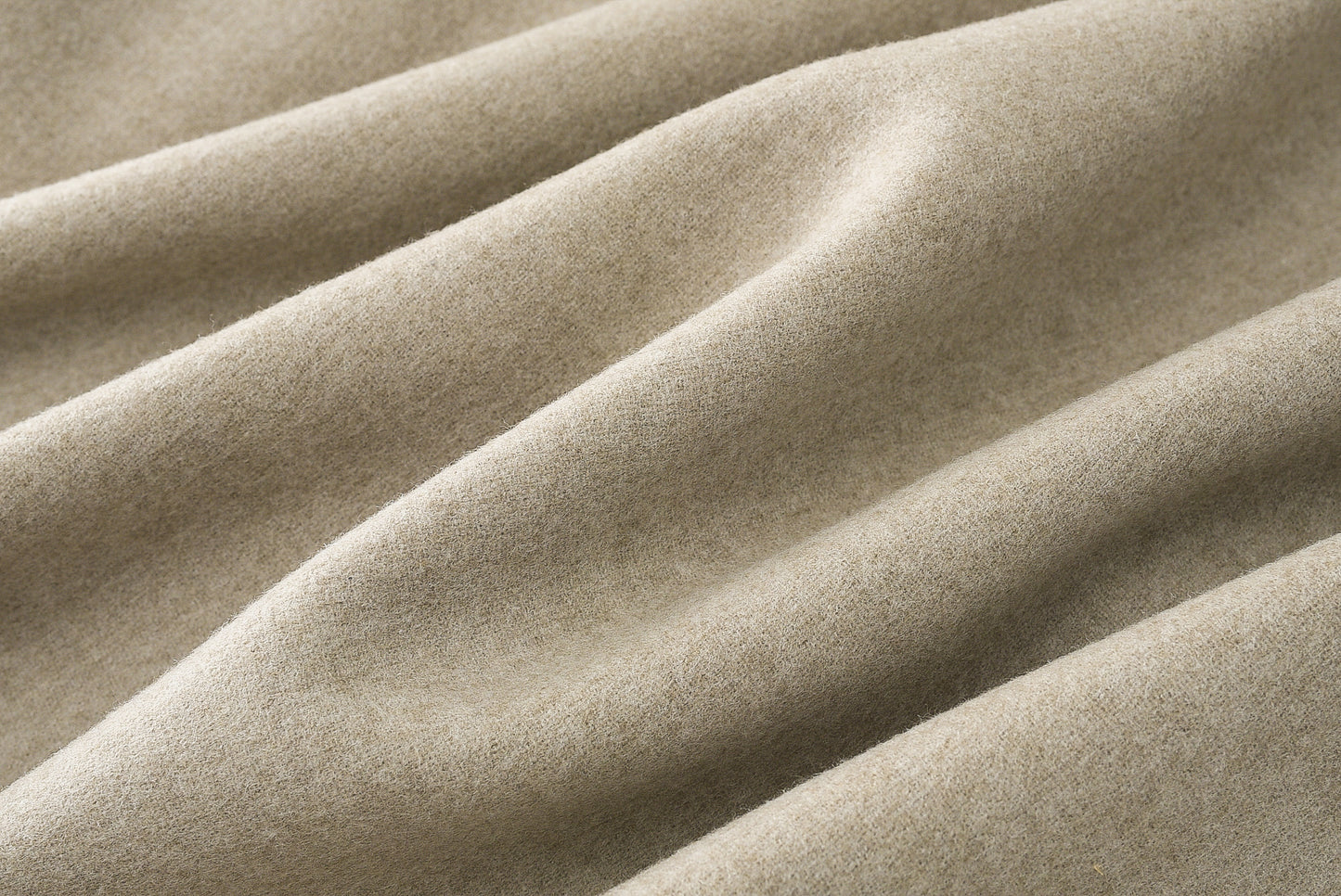 Loden poncho with silk details