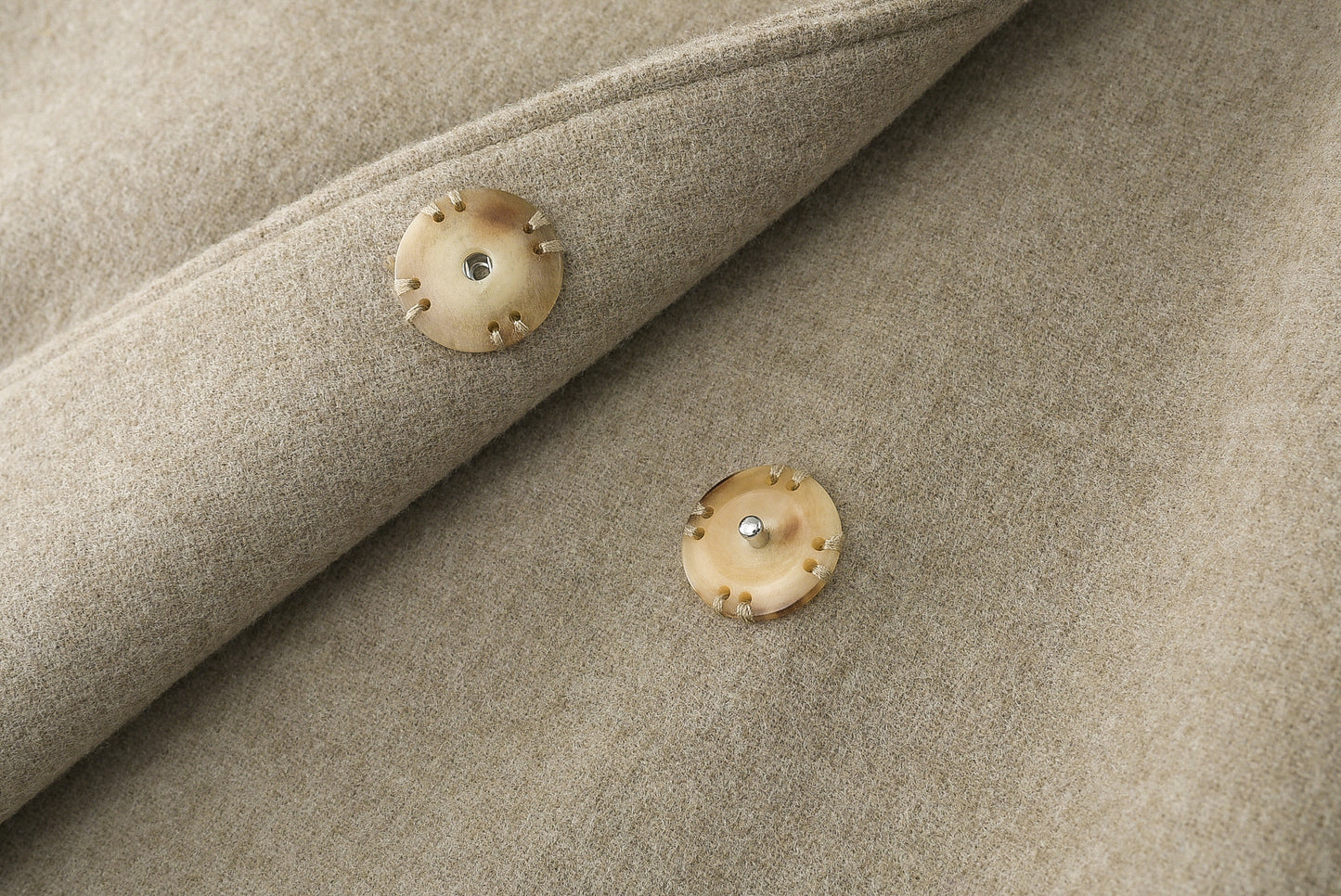 Loden poncho with silk details