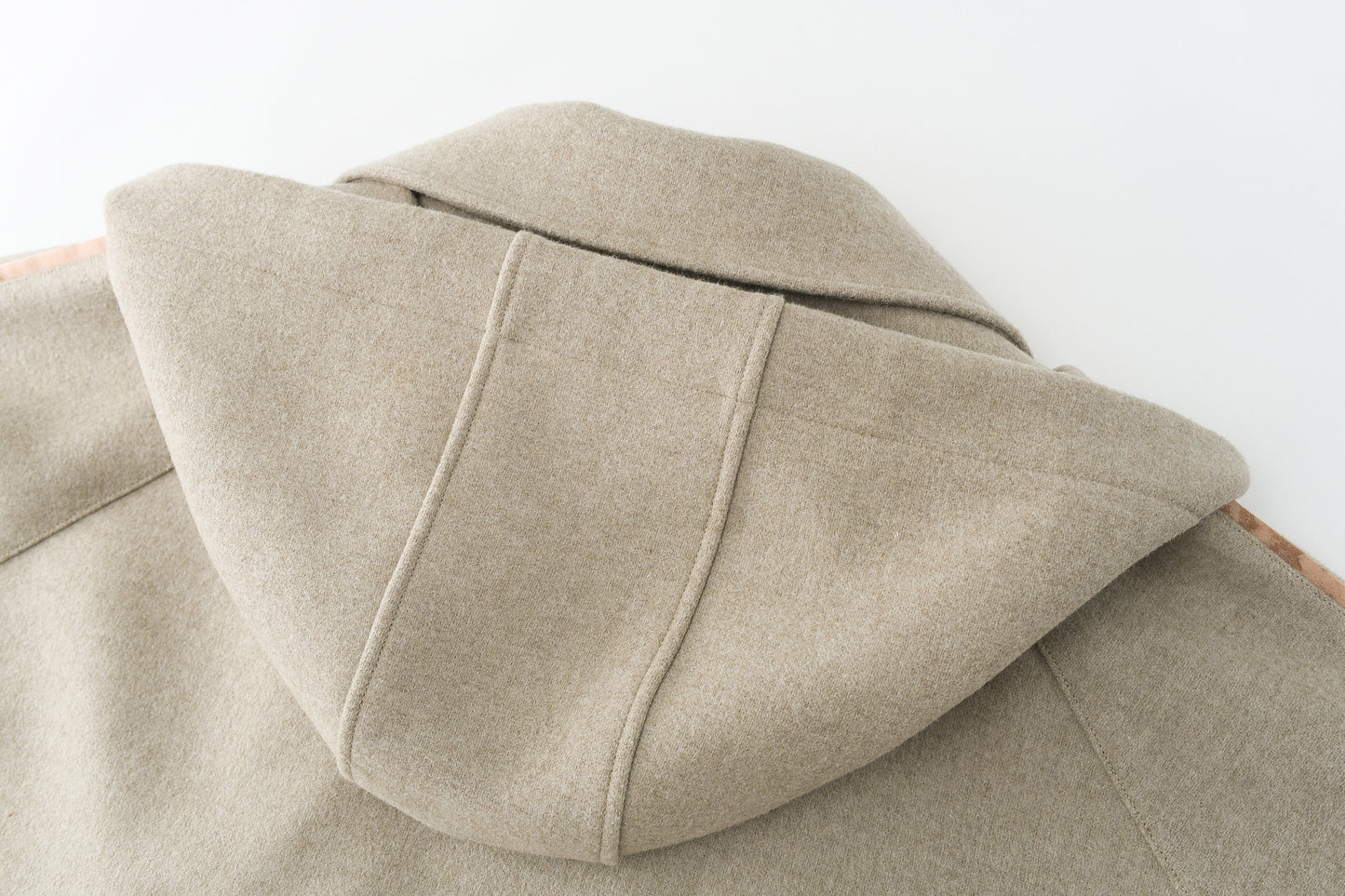 Loden poncho with silk details